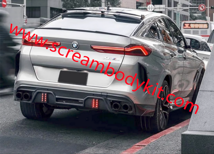 BMW X6M X6 body kit front lip side skirts rear lip spoiler fenders hood